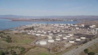 5K aerial stock footage of approaching ConocoPhillips Oil Refinery, Rodeo, California Aerial Stock Footage | AXSF08_014