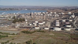 5K aerial stock footage of flying by the ConocoPhillips Oil Refinery, Rodeo, California Aerial Stock Footage | AXSF08_015