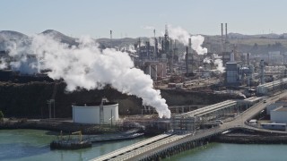 5K aerial stock footage of flying by the ConocoPhillips Oil Refinery, Rodeo, California Aerial Stock Footage | AXSF08_020