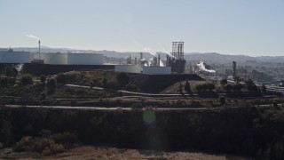 AXSF08_023 - 5K aerial stock footage of flying away from the ConocoPhillips Oil Refinery, Rodeo, California