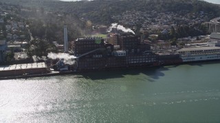 AXSF08_027 - 5K aerial stock footage of approaching and flying by the C&H Pure Cane Sugar Factory, Crockett, California