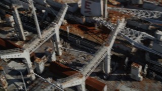 AXSF08_042 - 5K aerial stock footage pan across a warship, National Defense Reserve Fleet, Suisun Bay, California