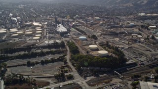 AXSF08_049 - 5K aerial stock footage of flying by the Shell Oil Refinery, Martinez, California