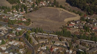 AXSF09_004 - 5K aerial stock footage of flying away from suburban tract homes, Pleasant Hill, California