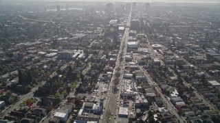 5K aerial stock footage of panning across urban neighborhoods to reveal Broadway, Oakland, California Aerial Stock Footage | AXSF09_015