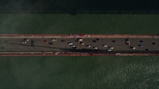 5K aerial stock footage of bird's eye view of light traffic on the famous Golden Gate Bridge, San Francisco, California Aerial Stock Footage | AXSF09_036