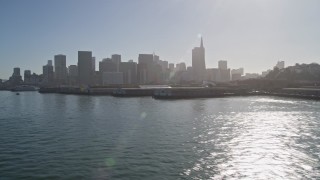 5K aerial stock footage flyby piers, with a view of the skyline in Downtown San Francisco, California Aerial Stock Footage | AXSF09_054