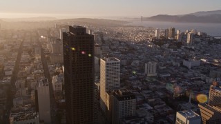 5K aerial stock footage fly past 555 California Street toward Nob Hill high-rises, Downtown San Francisco, California, sunset Aerial Stock Footage | AXSF10_002