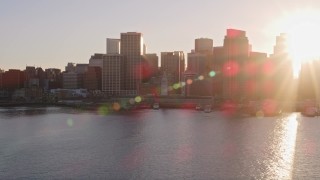 5K aerial stock footage setting sun over skyscrapers and Ferry Building, Downtown San Francisco, California, sunset Aerial Stock Footage | AXSF10_014