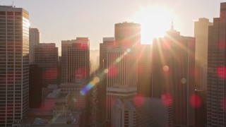 5K aerial stock footage of tilting from the bay to reveal Ferry Building and skyscrapers in Downtown San Francisco, California, sunset Aerial Stock Footage | AXSF10_015