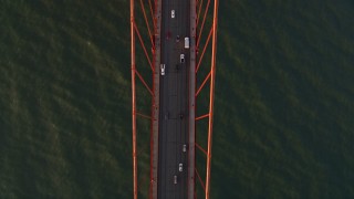 5K aerial stock footage bird's eye view of traffic on the Golden Gate Bridge, San Francisco, California, sunset Aerial Stock Footage | AXSF10_039