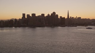 5K aerial stock footage of the Ferry Building and Downtown San Francisco skyline, California, sunset Aerial Stock Footage | AXSF10_067