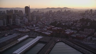 5K aerial stock footage pan across San Francisco Bay to reveal Coit Tower, Fisherman's Wharf, and downtown, California, sunset Aerial Stock Footage | AXSF10_079