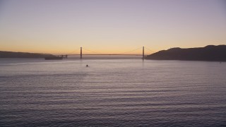 5K aerial stock footage approaching the Golden Gate Bridge, San Francisco, California, twilight Aerial Stock Footage | AXSF10_083