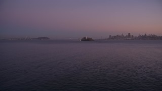 5K aerial stock footage pan across San Francisco Bay, reveal Alcatraz and Downtown San Francisco skyline, California, twilight Aerial Stock Footage | AXSF10_084