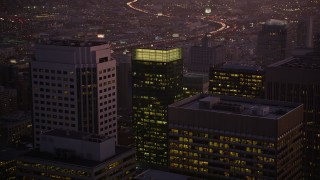 5K aerial stock footage fly over skyscrapers, reveal freeway and police station in South of Market, San Francisco, California, twilight Aerial Stock Footage | AXSF10_093