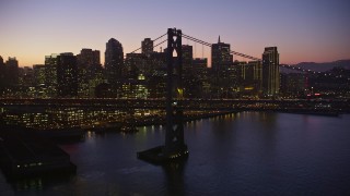 5K aerial stock footage of the city's skyline and Bay Bridge, Downtown San Francisco, California, twilight Aerial Stock Footage | AXSF10_102