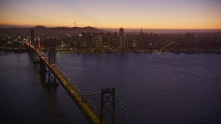 5K aerial stock footage of the Bay Bridge and the Downtown San Francisco skyline, California, twilight Aerial Stock Footage | AXSF10_106