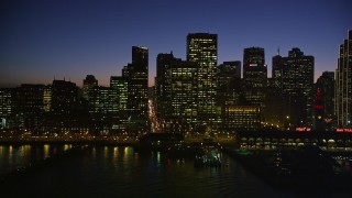 5K aerial stock footage passing by the Ferry Building and skyline of Downtown San Francisco, California, twilight Aerial Stock Footage | AXSF10_115