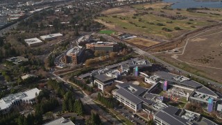 AXSF11_042 - 5K aerial stock footage flyby and approach Googleplex office buildings, Mountain View, California