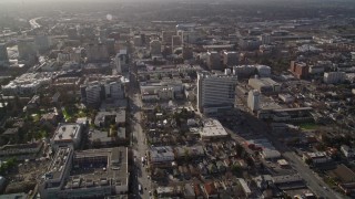 5K aerial stock footage of following East San Fernando Street, approaching city hall, Downtown San Jose, California Aerial Stock Footage | AXSF12_007