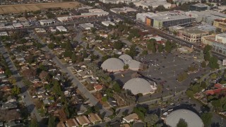 5K aerial stock footage of shopping center, suburban homes, reveal Winchester Mystery House, San Jose, California Aerial Stock Footage | AXSF12_020