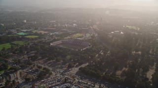 5K aerial stock footage reverse view of Stanford Stadium, pan across campus of Stanford University, Stanford, California Aerial Stock Footage | AXSF12_042