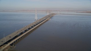 5K aerial stock footage tilt from wetlands to reveal San Francisco Bay and Dumbarton Bridge, California Aerial Stock Footage | AXSF12_063