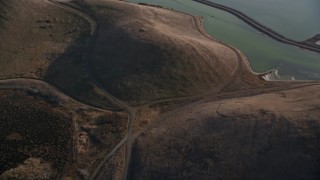 5K aerial stock footage of a reverse view of Coyote Hills Regional Park, Fremont, California Aerial Stock Footage | AXSF12_071