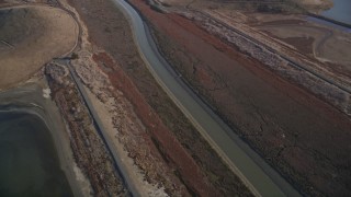 5K aerial stock footage of flying away from hills, marshland, Union City, California Aerial Stock Footage | AXSF12_073