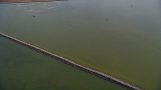 5K aerial stock footage of a reverse view of wetlands in Union City, California Aerial Stock Footage | AXSF12_075