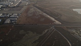 5K aerial stock footage of a reverse view of marshland, Hayward, California Aerial Stock Footage | AXSF12_082