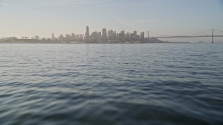 5K aerial stock footage of tilting from the bay to reveal the Downtown San Francisco skyline, California Aerial Stock Footage | AXSF13_004