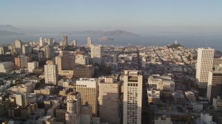 AXSF13_017 - 5K aerial stock footage of flying over Stockton Street with view of Mark Hopkins Hotel, Alcatraz in Nob Hill, San Francisco, California