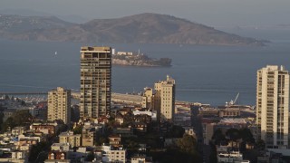 AXSF13_020 - 5K aerial stock footage of Alcatraz island prison seen from Russian Hill, San Francisco, California