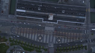 AXSF14_029 - 5K aerial stock footage bird's eye view of Market Street, reveal Justin Herman Plaza and Ferry Buildings, Downtown San Francisco, California, sunset