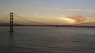 5K aerial stock footage of flying away from center of Golden Gate Bridge, San Francisco, California, twilight Aerial Stock Footage | AXSF14_042