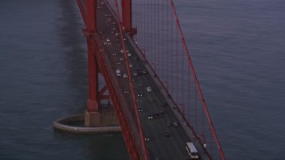 5K aerial stock footage of traffic on famous Golden Gate Bridge in San Francisco, California, twilight Aerial Stock Footage | AXSF14_058