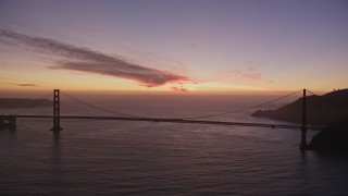 5K aerial stock footage of a reverse view of the Golden Gate Bridge, San Francisco, California, twilight Aerial Stock Footage | AXSF14_081