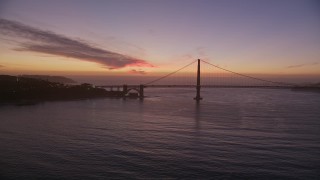 5K aerial stock footage of approaching the famous Golden Gate Bridge in San Francisco, California, twilight Aerial Stock Footage | AXSF14_083