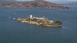 AXSF15_014 - 5K aerial stock footage of flying by Alcatraz island prison, San Francisco, California