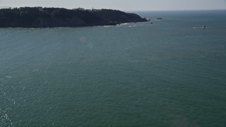 AXSF15_026 - 5K aerial stock footage of tilting from San Francisco Bay to reveal coastal cliffs, San Francisco, California