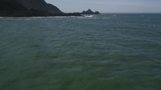 AXSF15_041 - 5K aerial stock footage tilt from the ocean to reveal rock formations, Pacifica, California