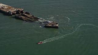 AXSF15_111 - 5K aerial stock footage orbit the SS Palo Alto shipwreck, and tilt to reveal Seacliff State Beach, Aptos, California