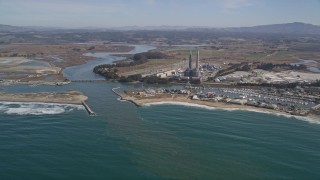 5K aerial stock footage of a power plant with smoke stacks near a beach, Moss Landing, California Aerial Stock Footage | AXSF15_113