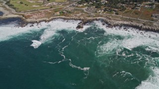 AXSF16_016 - 5K aerial stock footage tilt from the ocean, reveal Point Pinos Lighthouse Reservation, Monterey, California