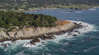 5K aerial stock footage of flying by oceanfront homes and coastline, Pebble Beach, California Aerial Stock Footage | AXSF16_028