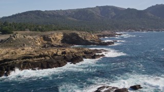 5K aerial stock footage of passing coastal cliffs in Carmel, California Aerial Stock Footage | AXSF16_048