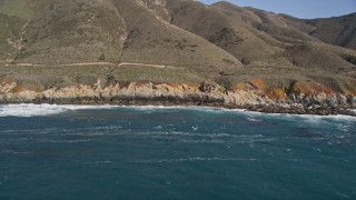 5K aerial stock footage of tilting up to reveal coastal cliffs and hills, Carmel, California Aerial Stock Footage | AXSF16_055