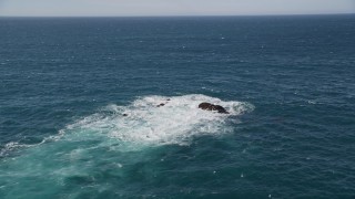 AXSF16_066 - 5K aerial stock footage of orbiting rock formations, revealing coastline, Carmel, California